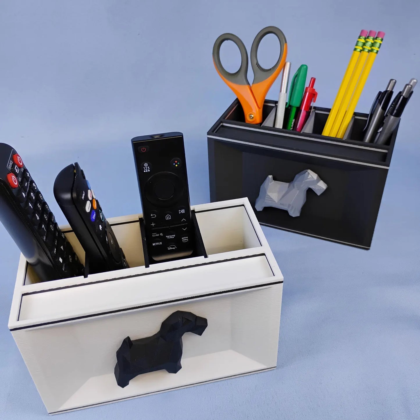 White Scottish Terrier desk organizer holding remotes, scissors, pens, and pencils
