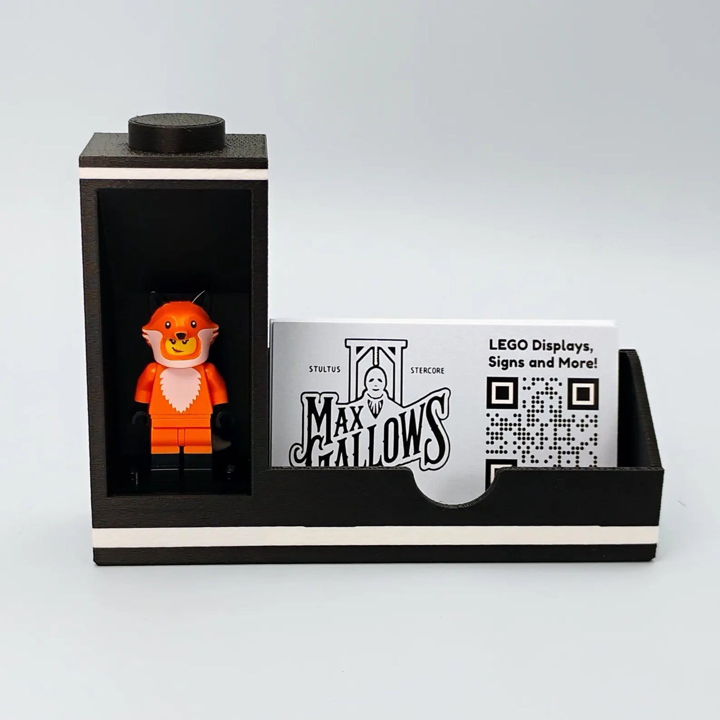 Black business card holder with LEGO® minifigure display alcove and sample cards