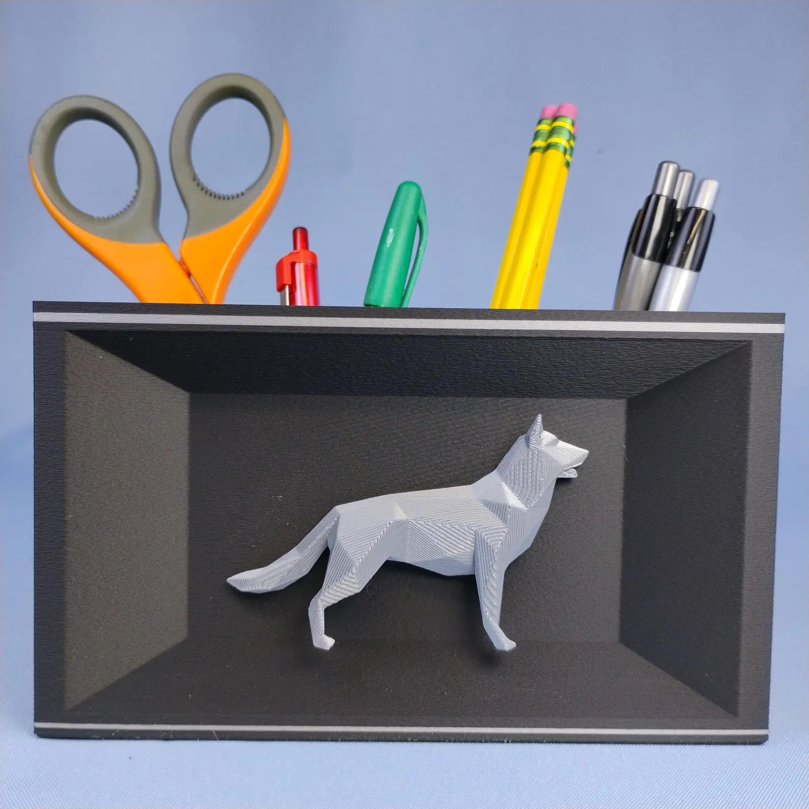 Black German Shepherd desk organizer with raised geometric dog detail shown from the front