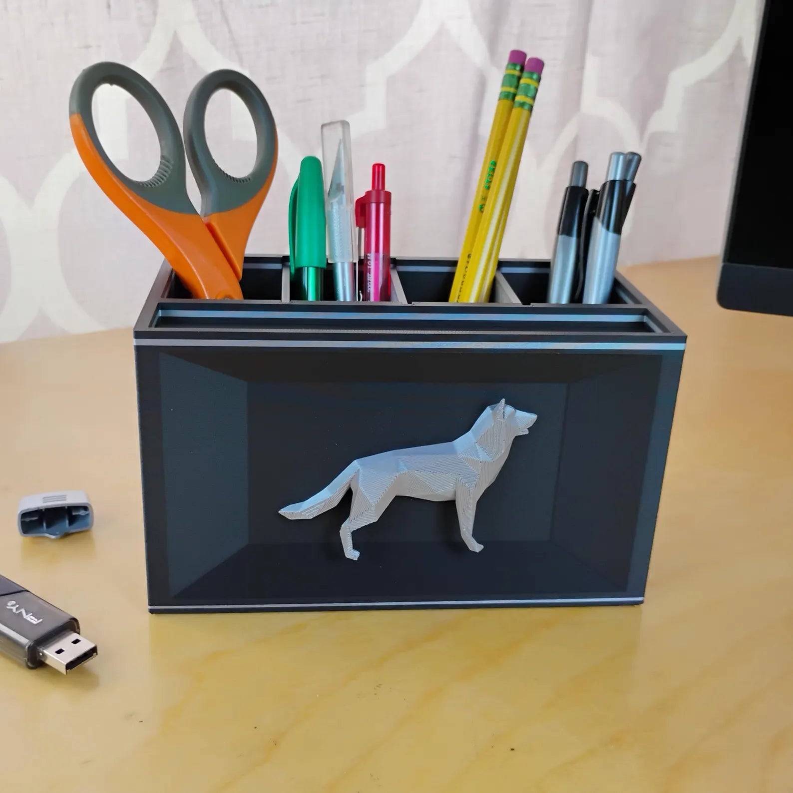 Black German Shepherd office organizer holding scissors, pencils, pens, and small desk supplies