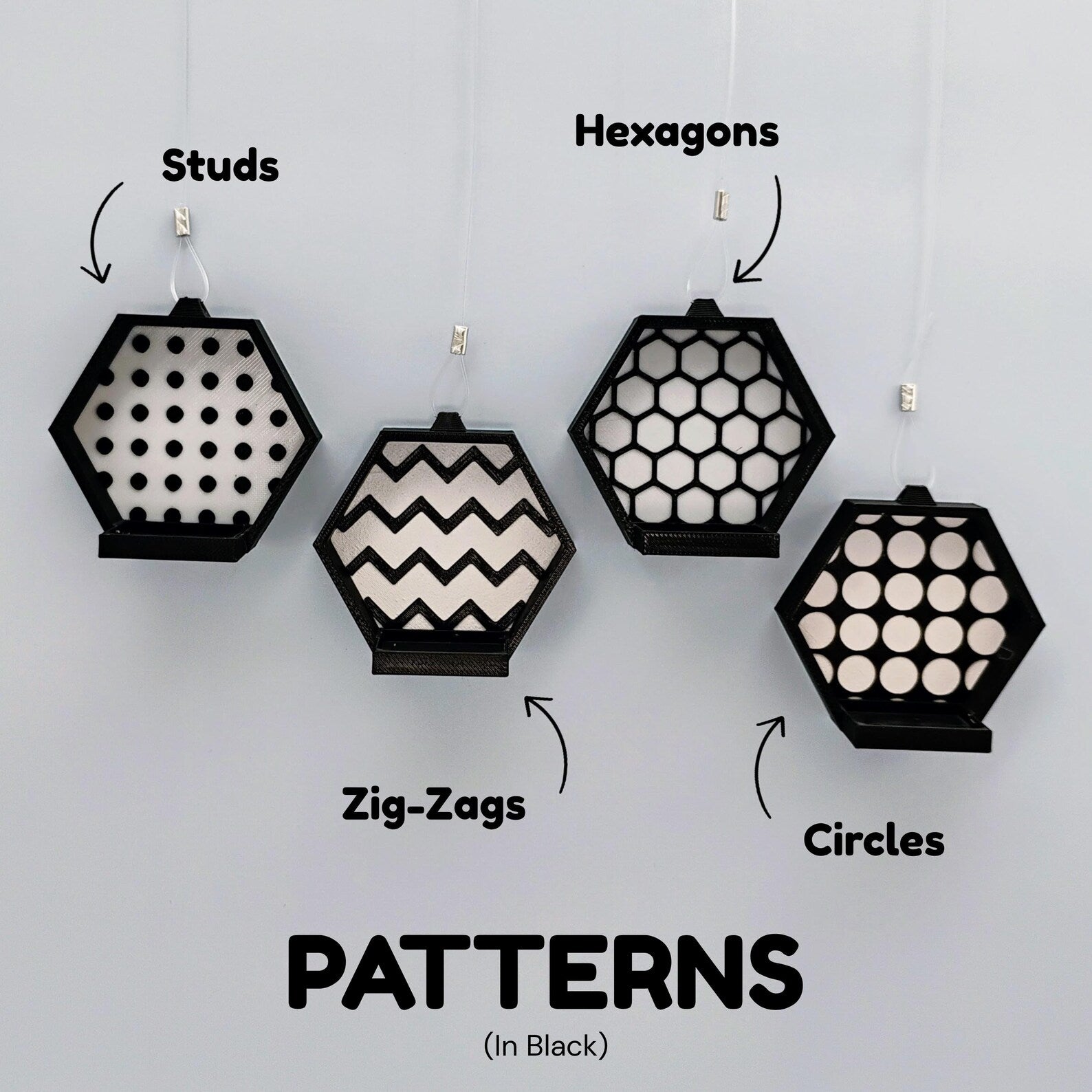 Pattern options for black hanging minifigure displays, showing studs, hexagons, zig-zag, and circles backgrounds.