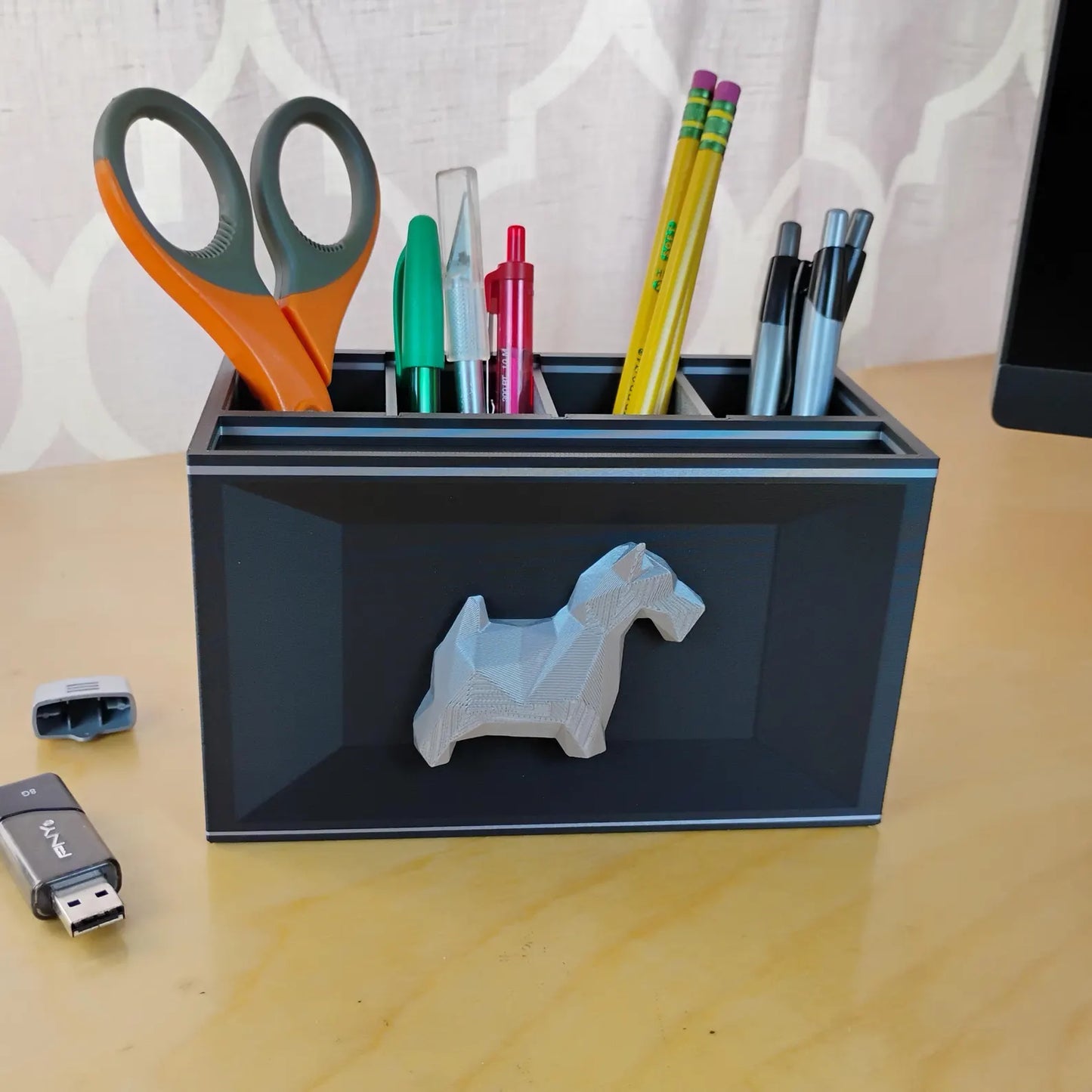 Black Scottish Terrier office organizer holding scissors, pencils, pens, and small desk supplies