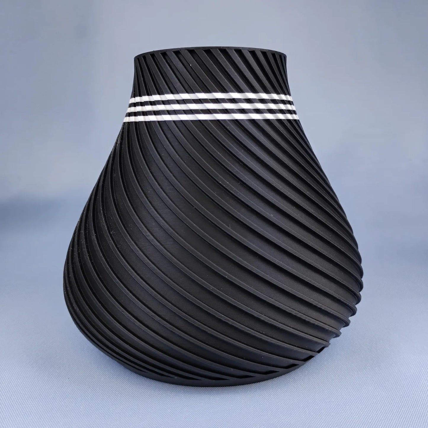 Black swirly vase with sculptural spiral texture for LEGO® botanical flower display