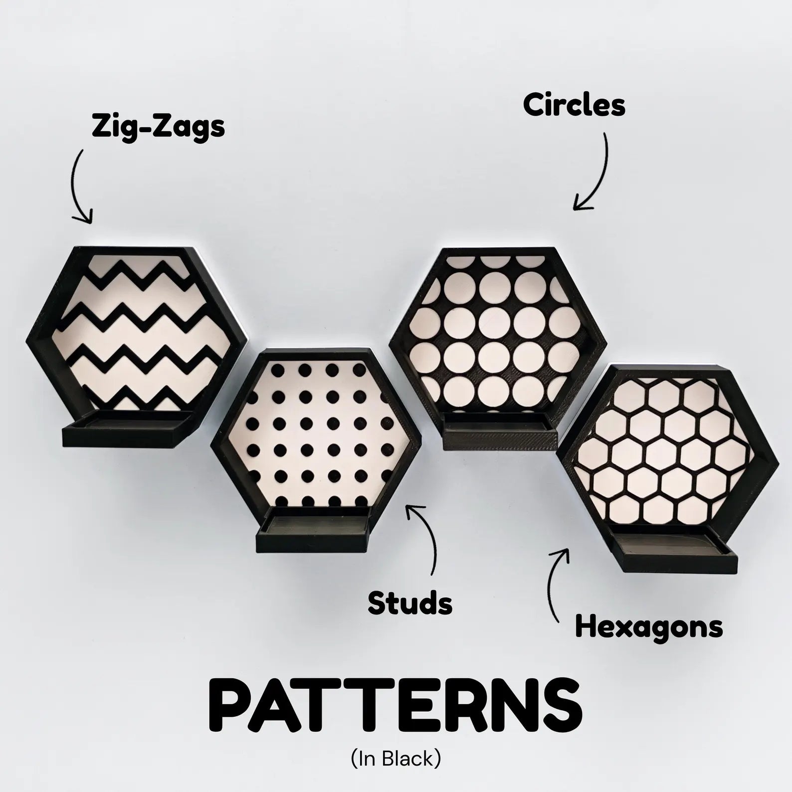 Black and white magnetic hexagon minifigure display pattern options showing zig-zags, circles, studs, and hexagons.
