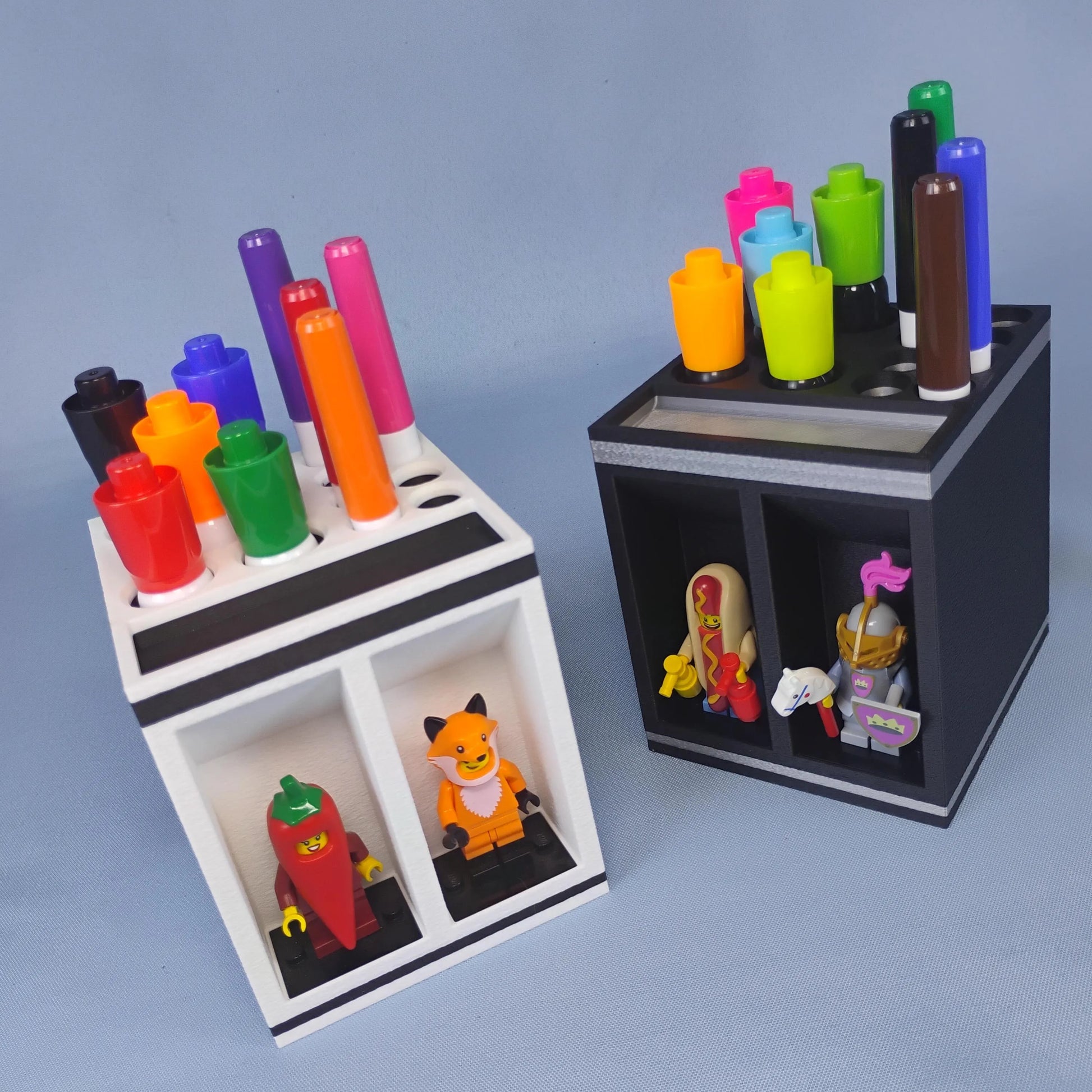 Black and white dry erase marker organizers shown together with colorful markers and LEGO® minifigures, demonstrating the available main color options.