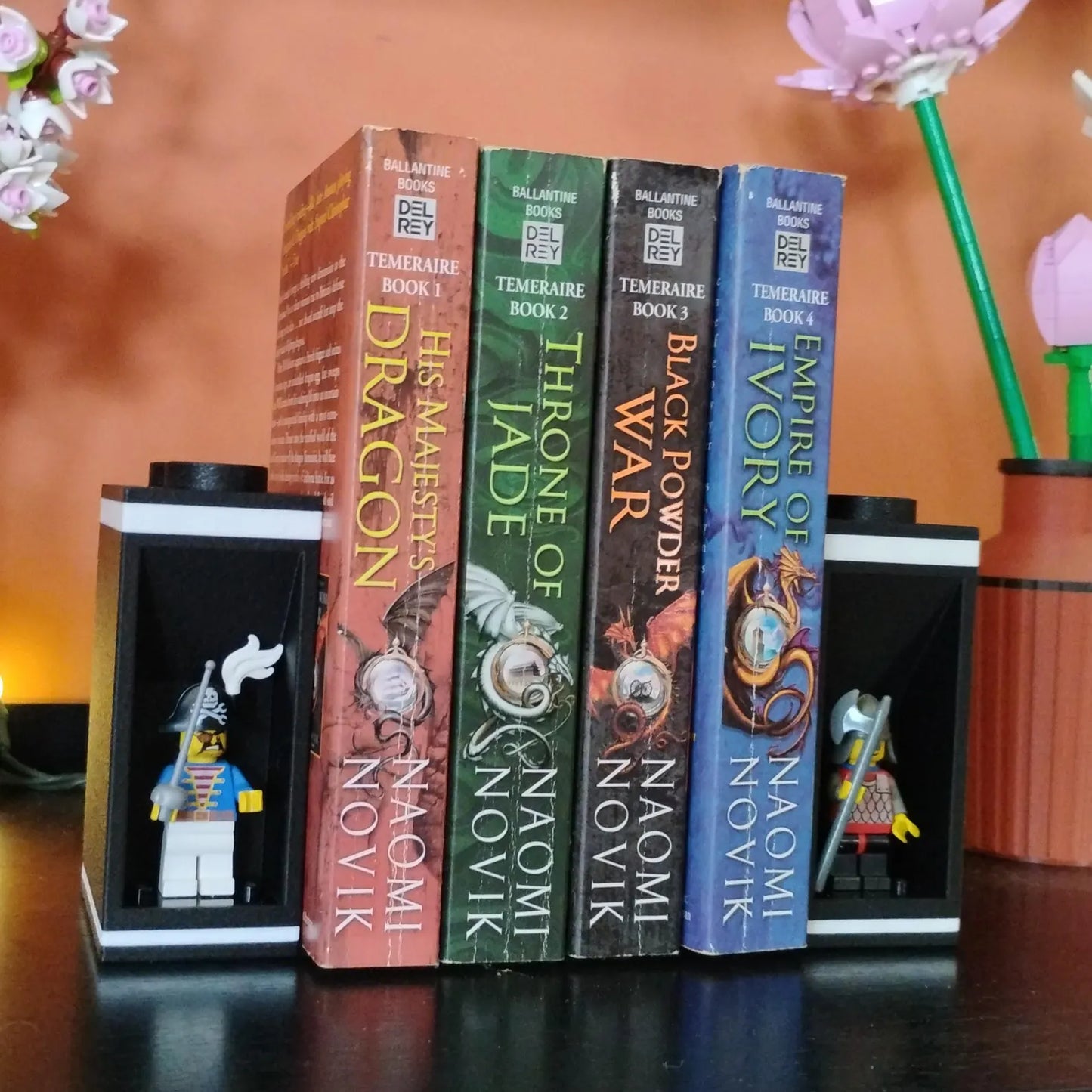 Bookends holding fantasy books with a LEGO® minifigure displayed in the side alcove