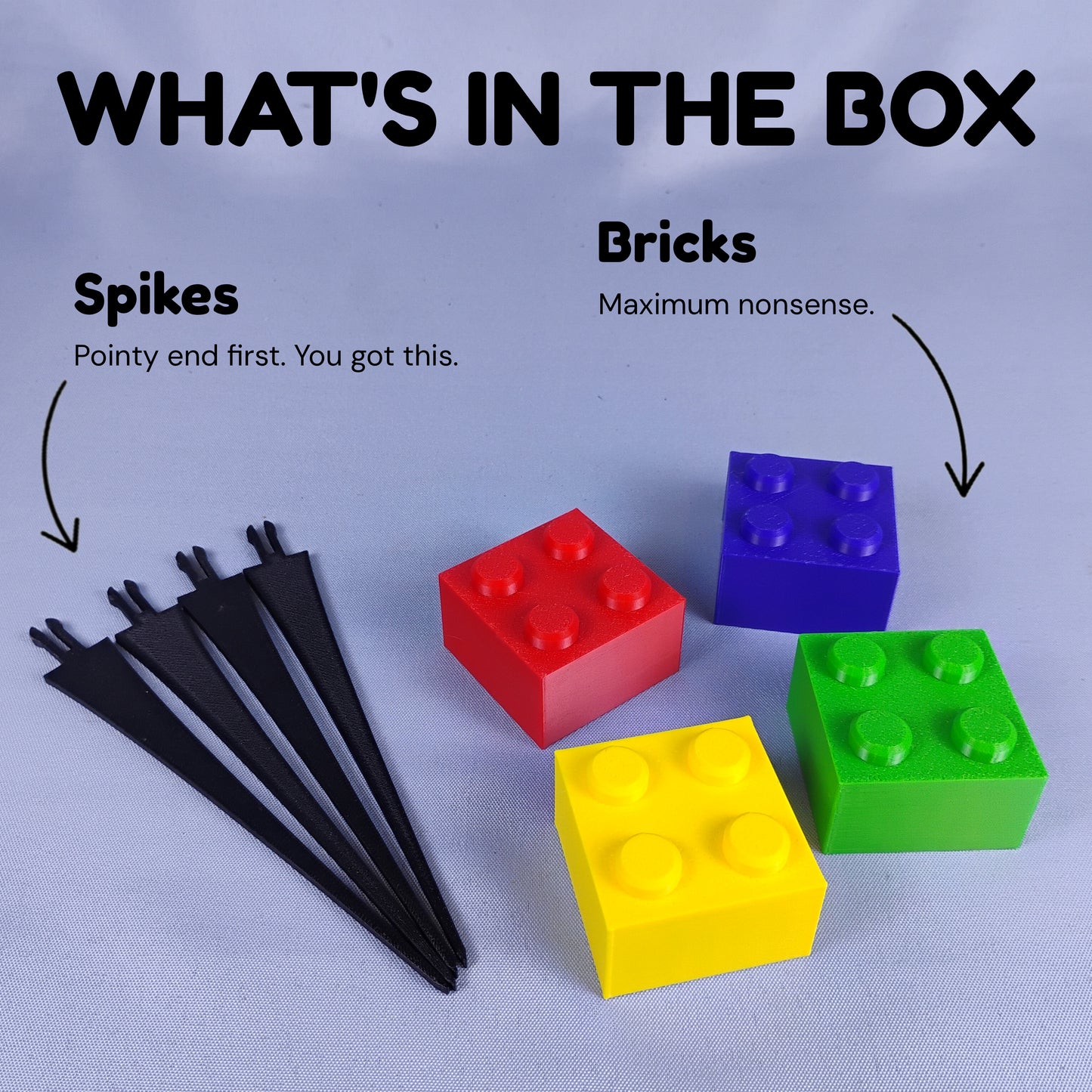 Building brick plant stake set showing four removable colorful brick toppers and four black plant stakes.
