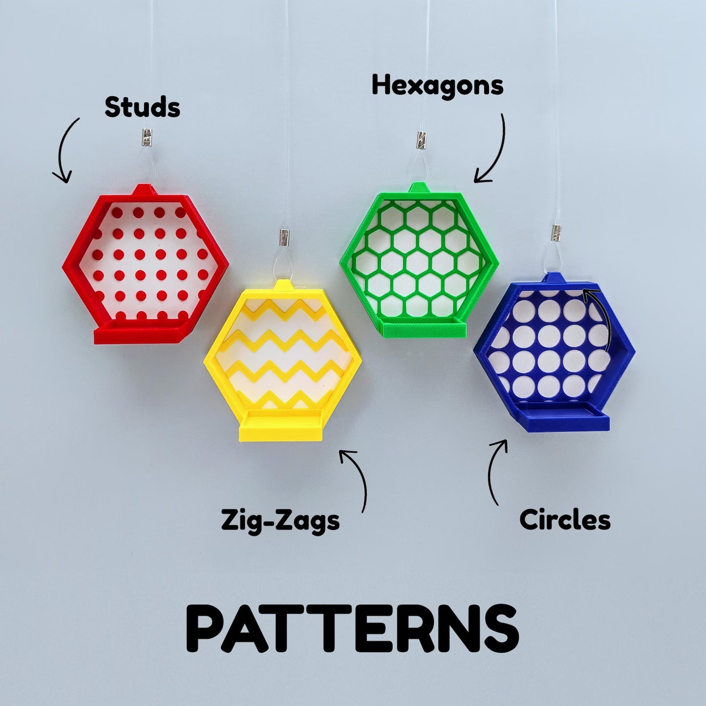 Color pattern options for hanging minifigure displays, showing red, yellow, green, and blue frames with different background designs.