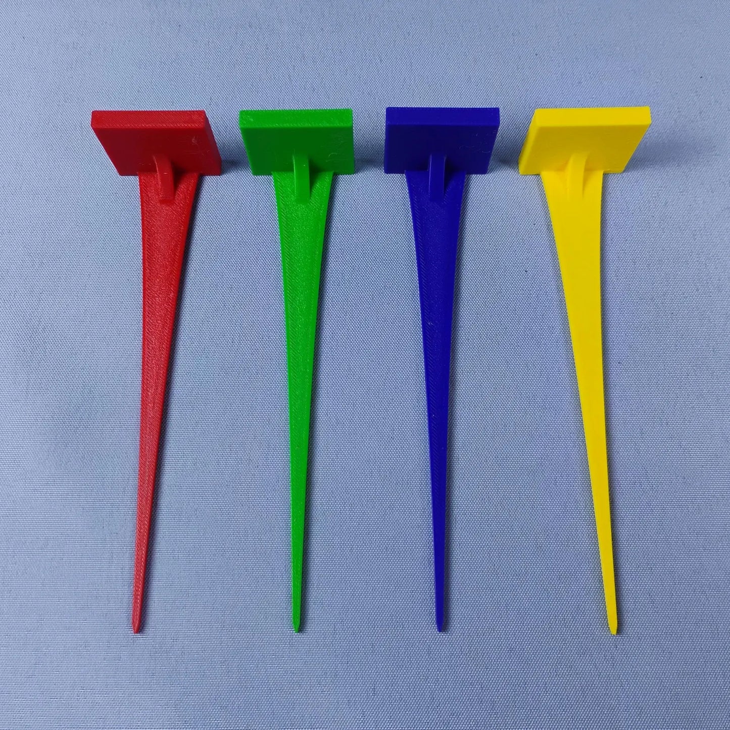 Set of red, green, blue, and yellow plant pot stakes for LEGO® minifigure displays