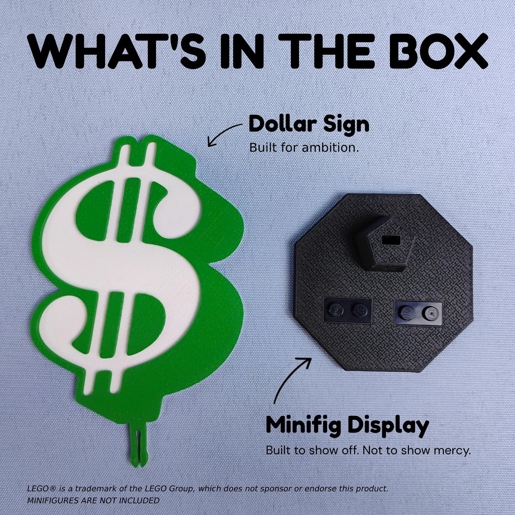 What’s in the box graphic for the dollar sign minifigure display, showing the green dollar sign backdrop and black display base.
