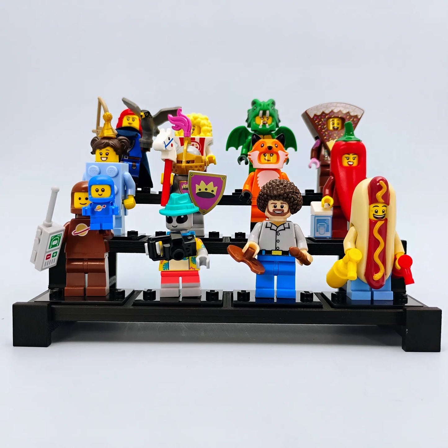 Front view of a tiered display stand holding LEGO® minifigures in a neat rowed display.