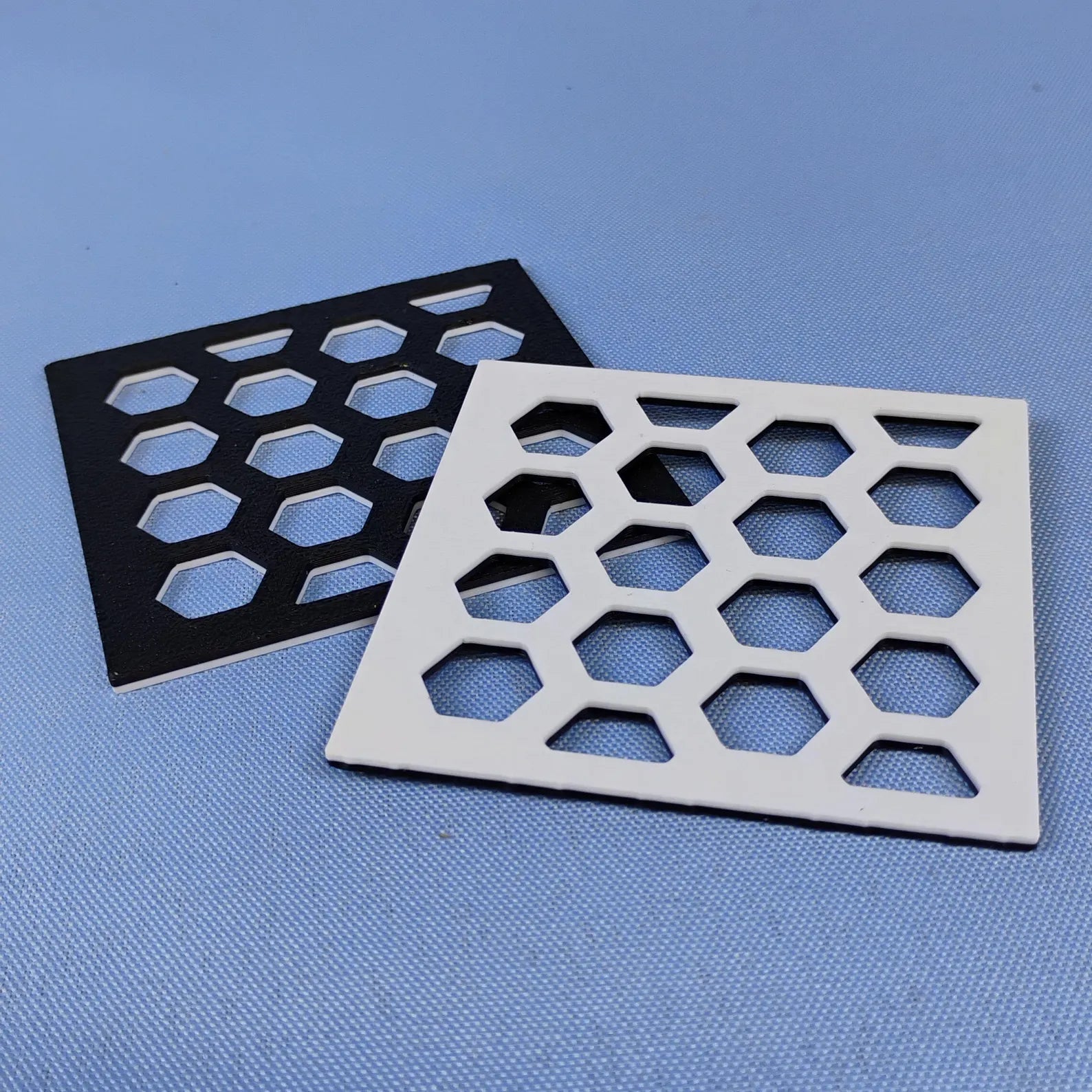 Black and white removable grid inserts for holding LEGO® botanical flower stems upright