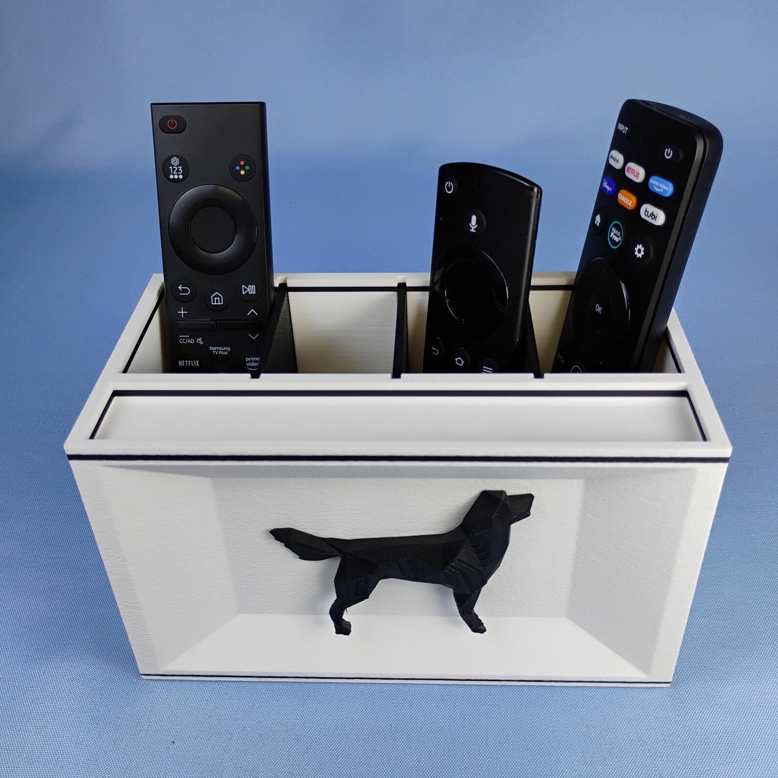 White Golden Retriever desk organizer holding TV remotes with raised black dog detail on the front