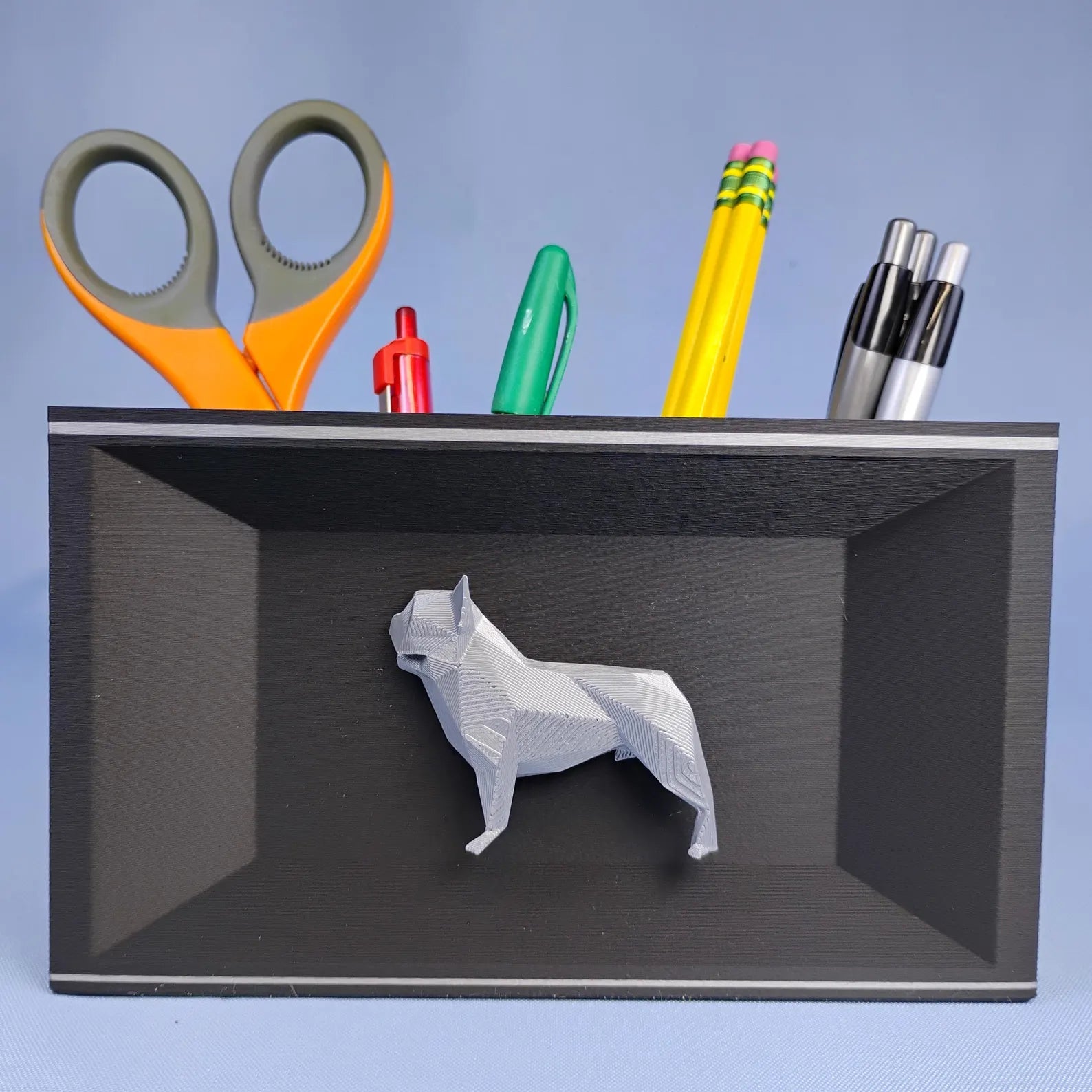 Gray French Bulldog desk organizer with raised geometric dog detail shown from the front