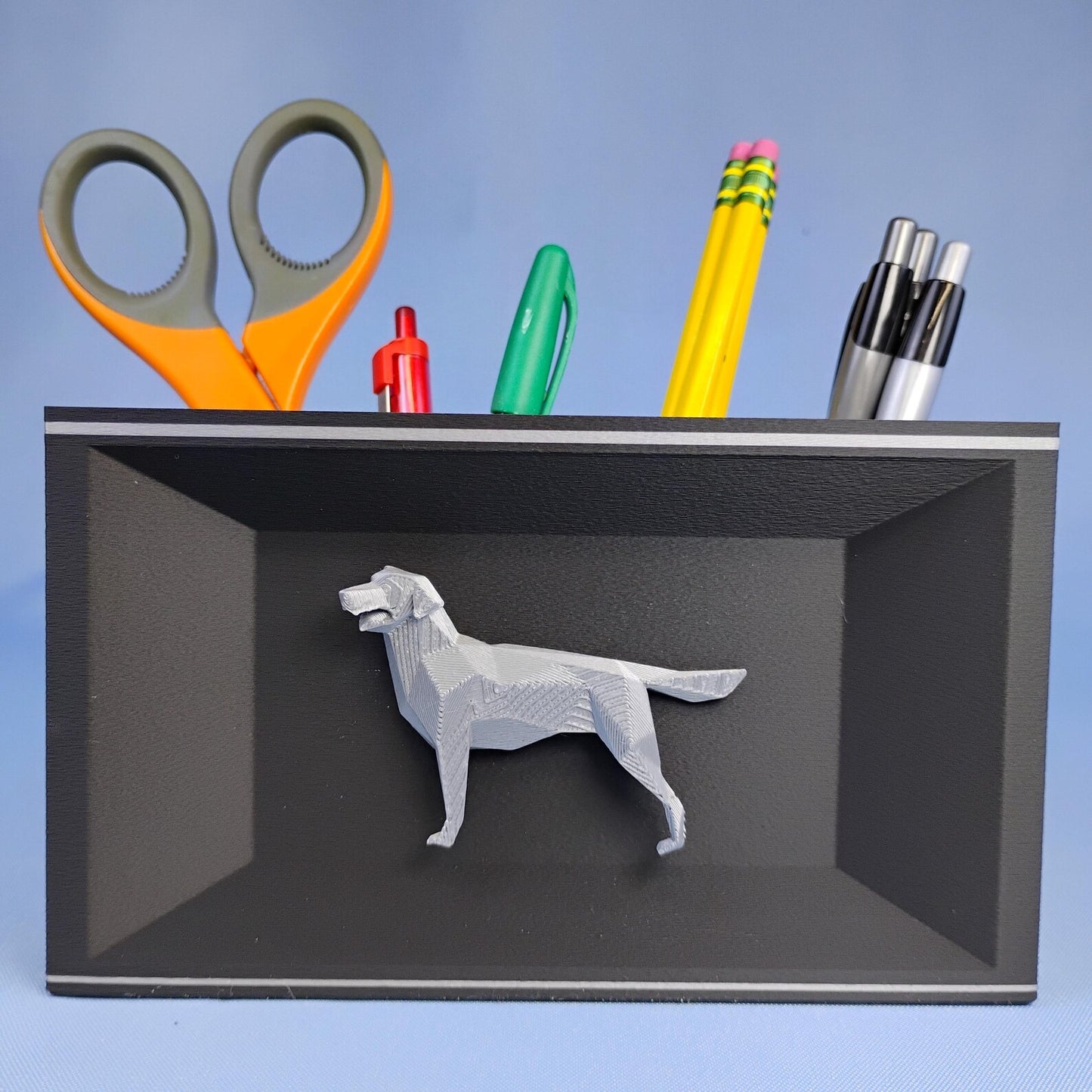 Gray Labrador desk organizer with raised geometric dog detail shown from the front