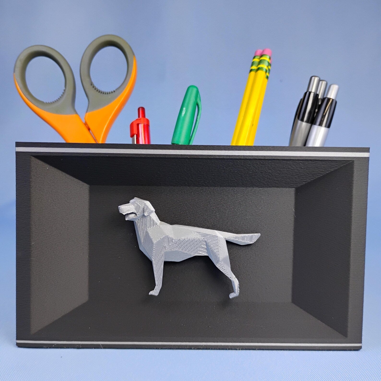 Gray Labrador desk organizer with raised geometric dog detail shown from the front