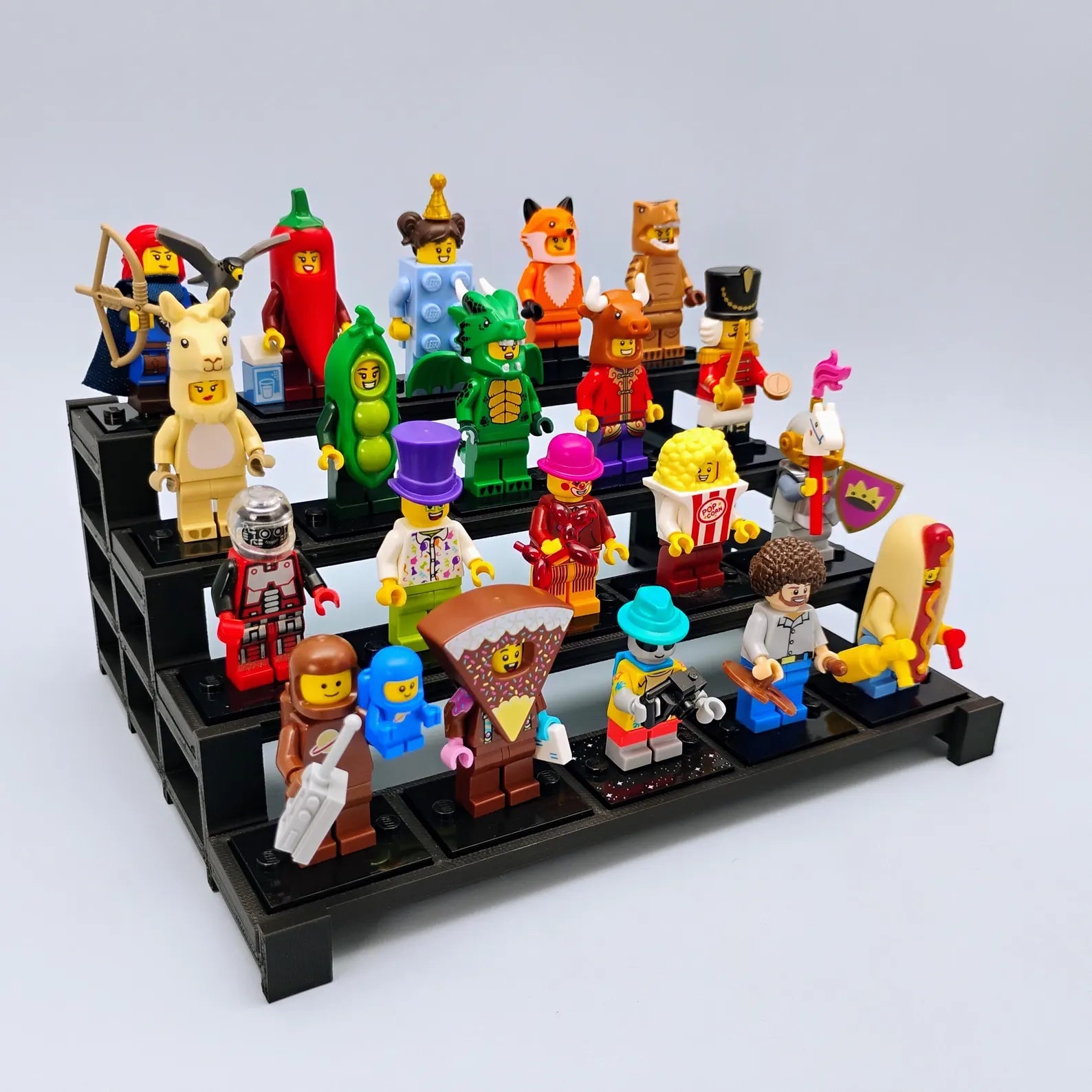 Large tiered display stand filled with LEGO® minifigures, showing capacity for a bigger collection.
