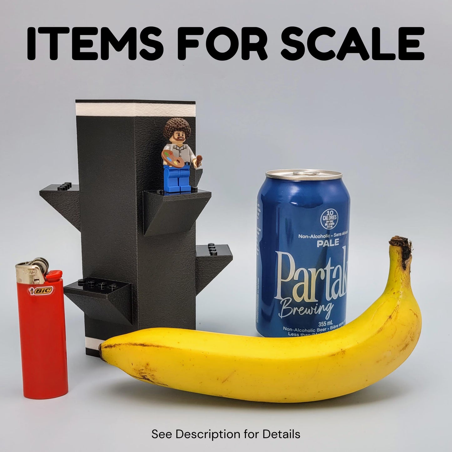 A lighter, 12 oz can, and a banana showing the scale of the size of a vase for LEGO botanical flowers