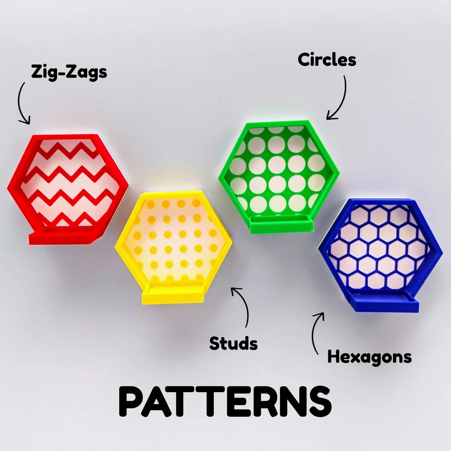 Pattern options for magnetic hexagon minifigure displays, showing zig-zags, circles, studs, and hexagons in multiple colors.