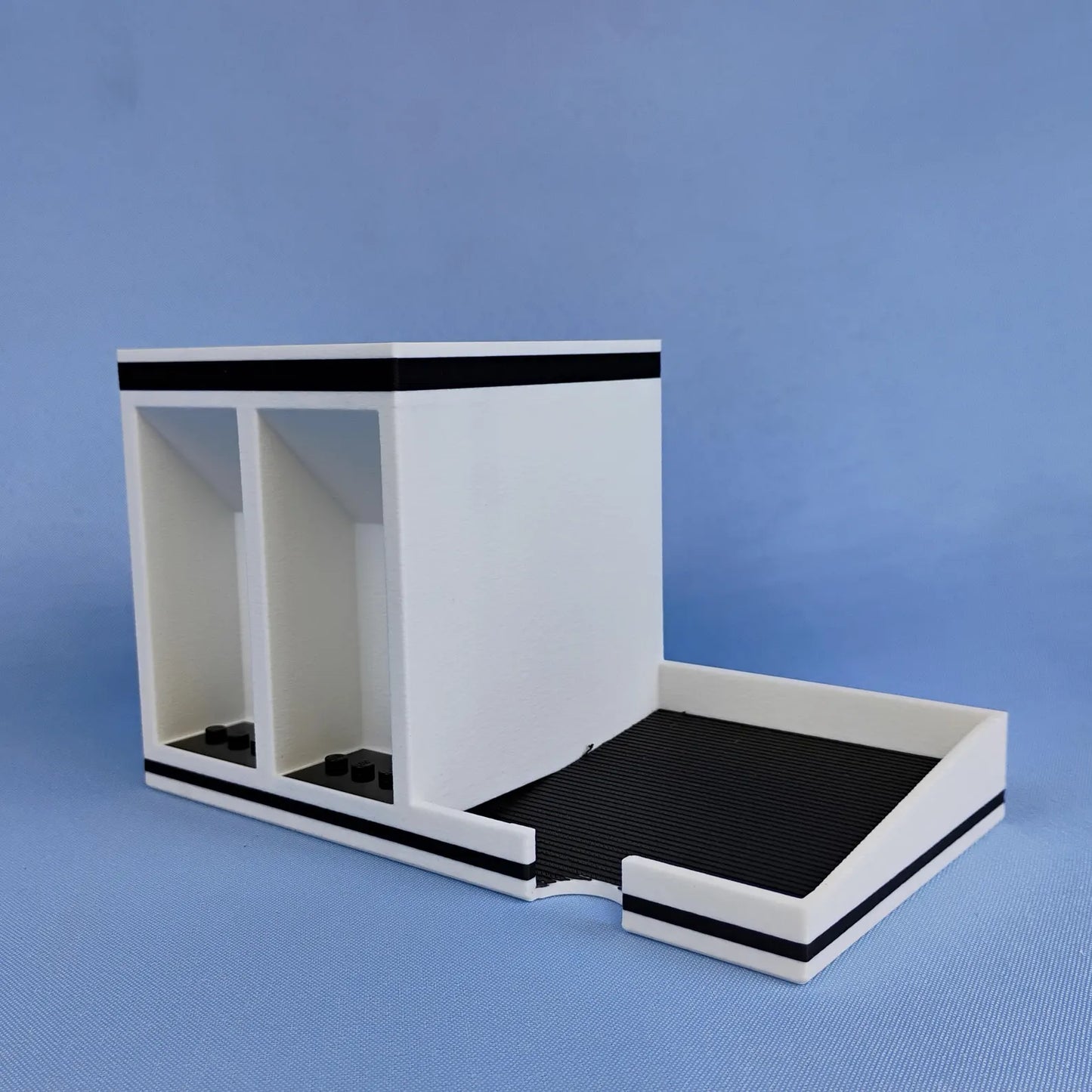 Back view of Post-it Note desk organizer showing pen compartment, sticky note tray, and display area