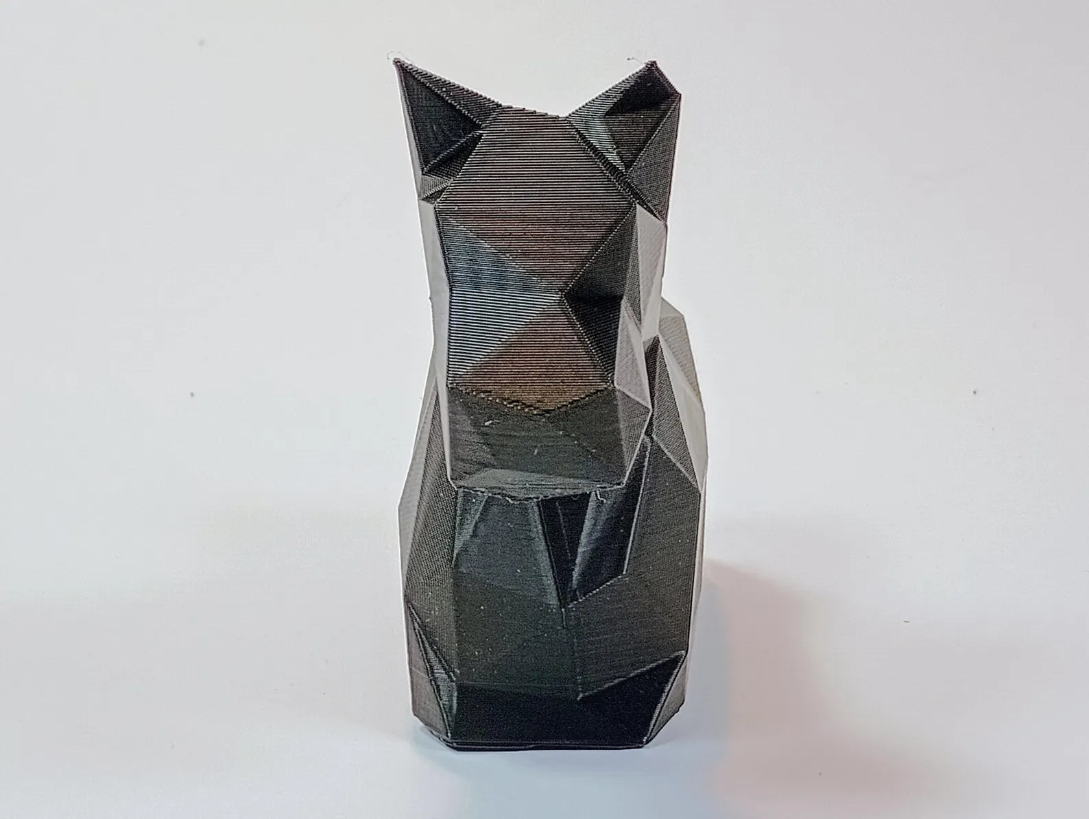 Scottish Terrier figurine shown from the front with angular low-poly styling
